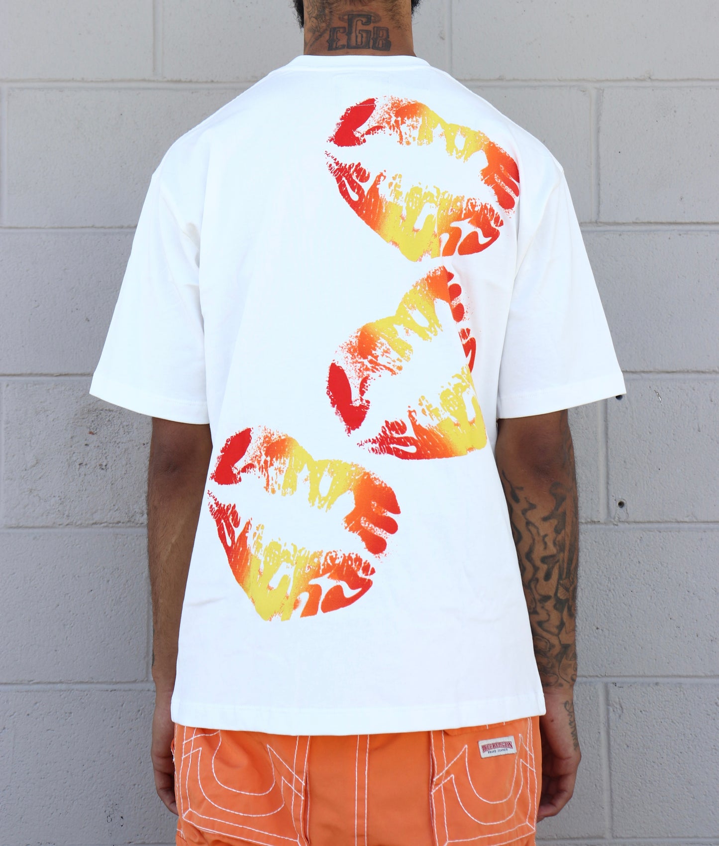 LOVE SUCKS COMIC TEE in WHITE