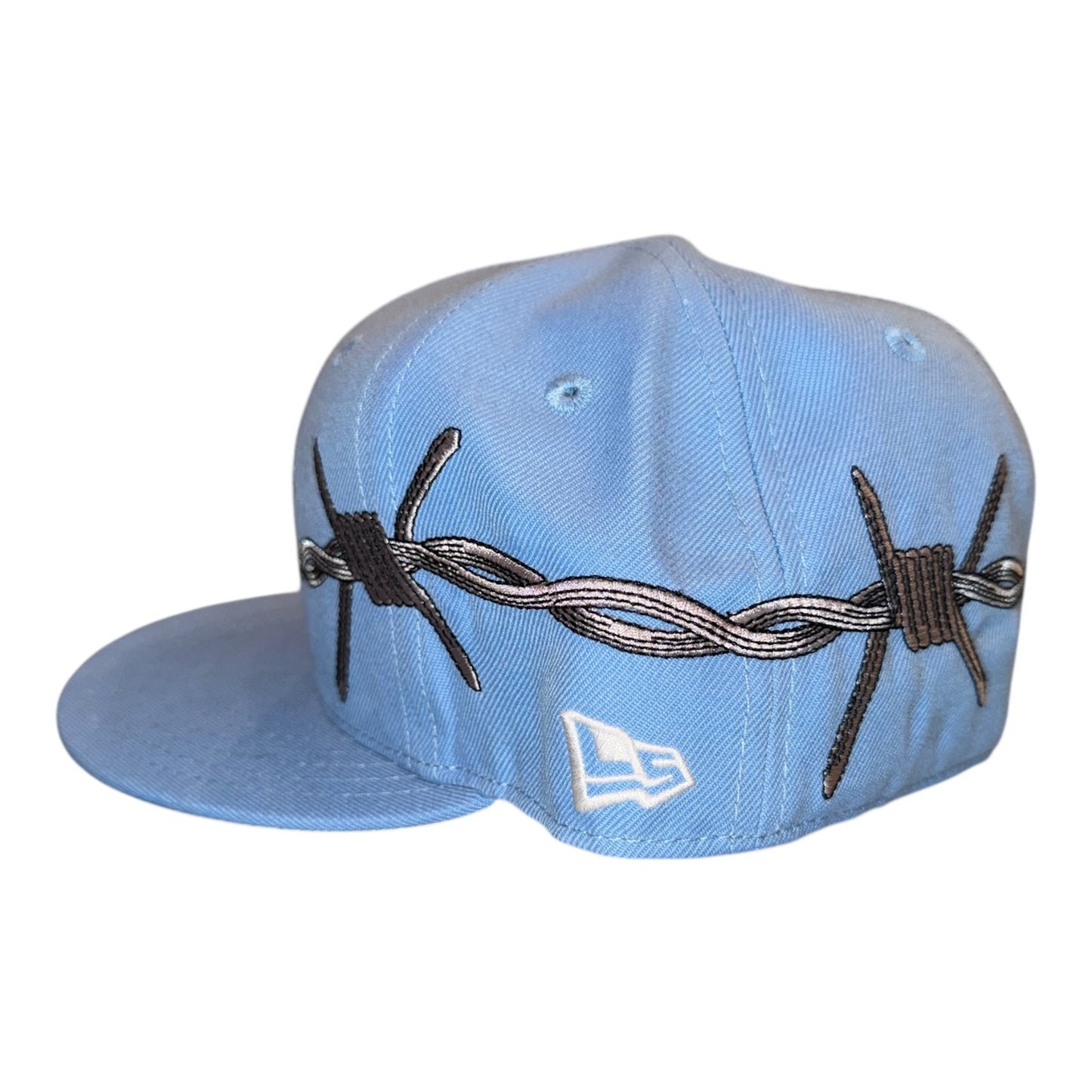 LOVE SUCKS BARBWIRE FITTED CAP in Powder Blue
