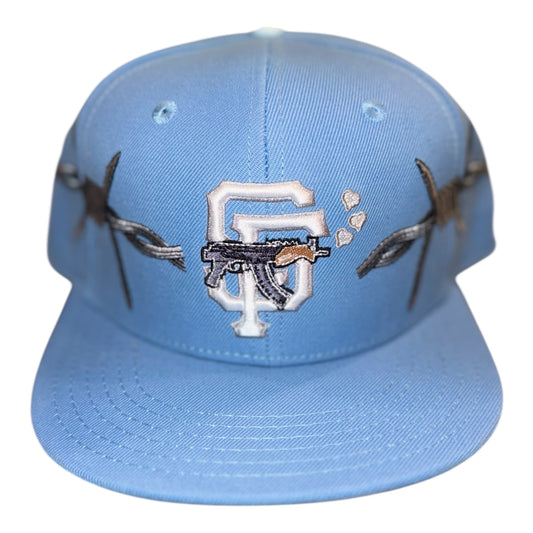 LOVE SUCKS BARBWIRE FITTED CAP in Powder Blue