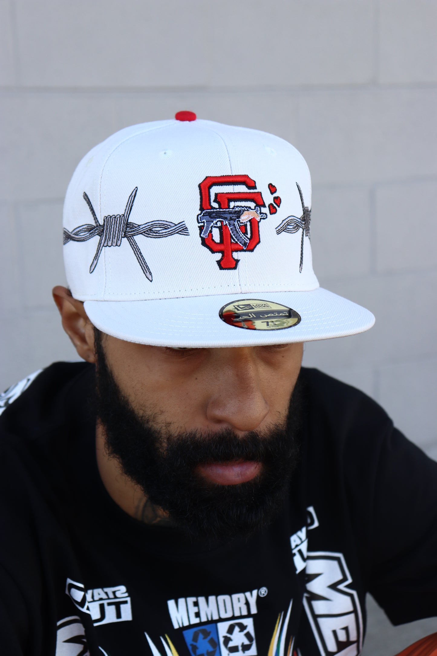 LOVE SUCKS BARBWIRE FITTED CAP in CREAM/RED