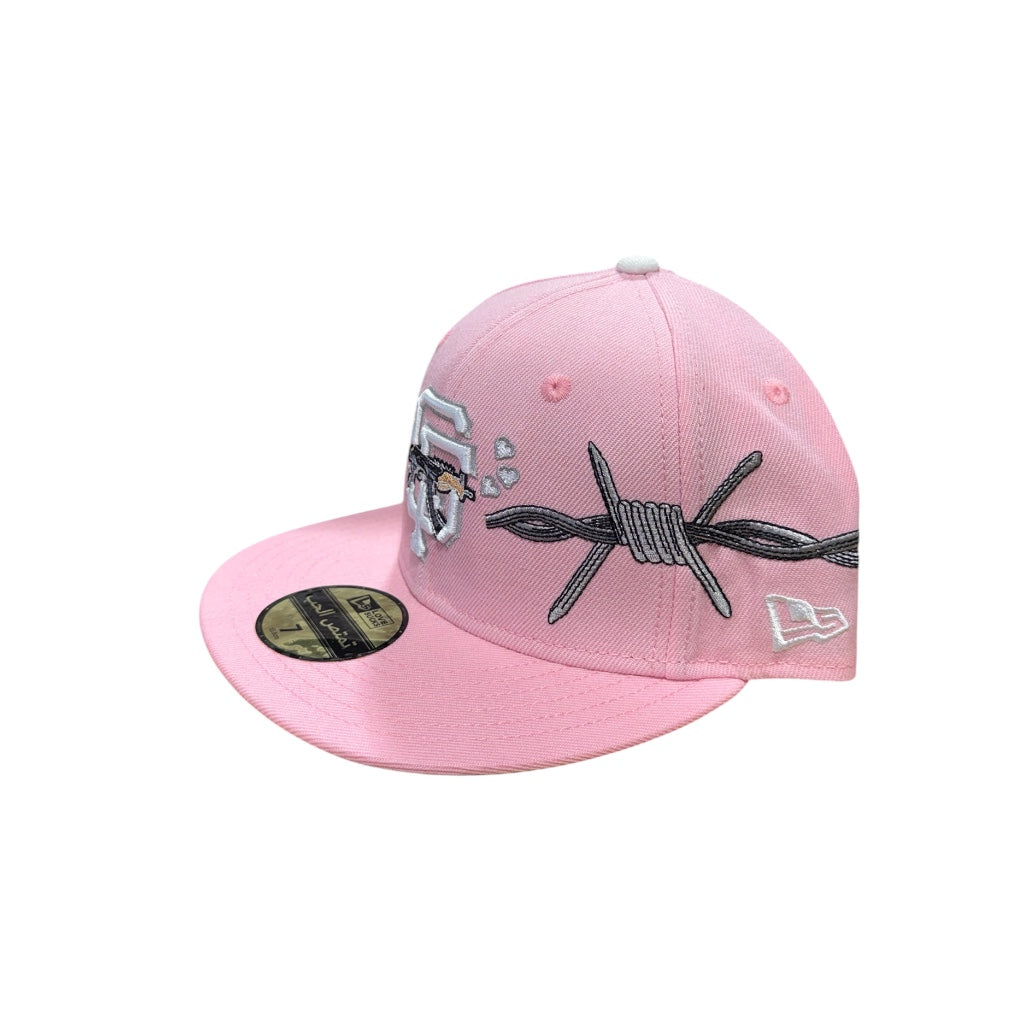 LOVE SUCKS BARBWIRE FITTED CAP in Pink