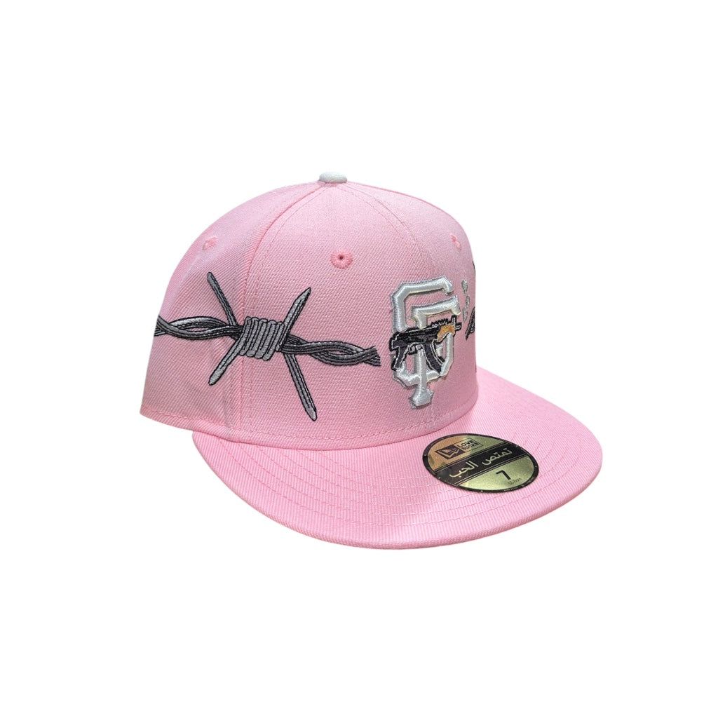 LOVE SUCKS BARBWIRE FITTED CAP in Pink